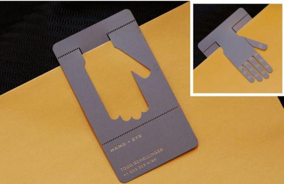 Contoh kartu nama yang dapat digunakan sebagai penjepit kertas, produk : Hand Eye /gambar : firewireblog.com